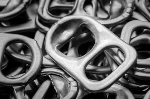 Beautiful reflection of metal ring pulls or aluminum can caps Stock Photos