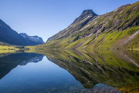 Beautiful reflection of mountains in the waters of Eidsvatnet lake Stock Photos