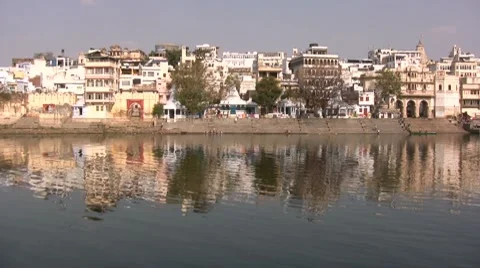 Beautiful reflection of river front in India Stock Footage