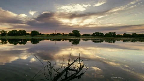Beautiful reflection of the sky in the lake. Timelapse Stock Footage 144231519