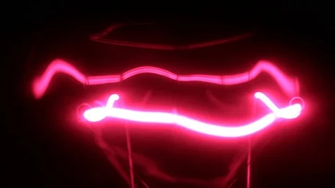 Beautiful reflections and glare of the red spiral of the incandescent lamp. Stock Footage 81329644