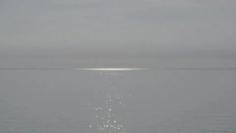 Beautiful reflections of the sun on the ocean Stock Footage 169646028