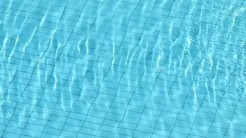 Beautiful refreshing blue swimming pool water surface Stock Footage 74421582