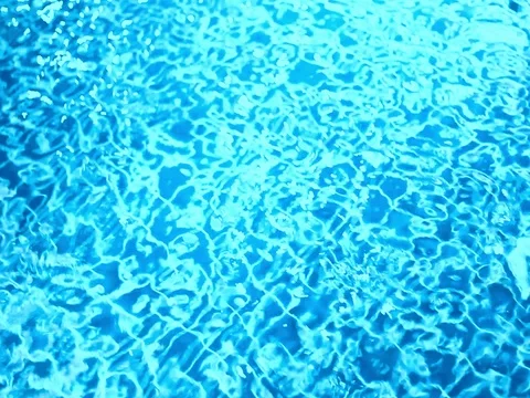 Beautiful refreshing blue swimming pool water Video stock 76991441