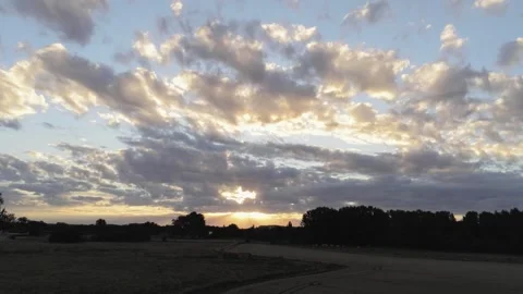 Beautiful relaxed timelapse of clouds moving over Stock Footage 244155376