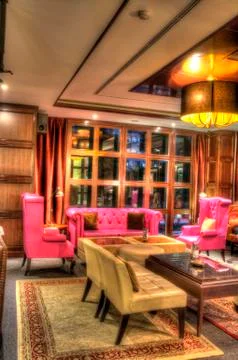 Beautiful restaurant interior design with table seating and lighting and othe Stock Photos
