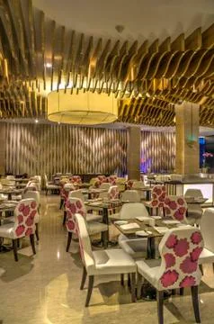 Beautiful restaurant interior design with table seating and lighting and othe Stock Photos