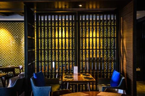 Beautiful restaurant interior with table setting and table ware Stock Photos