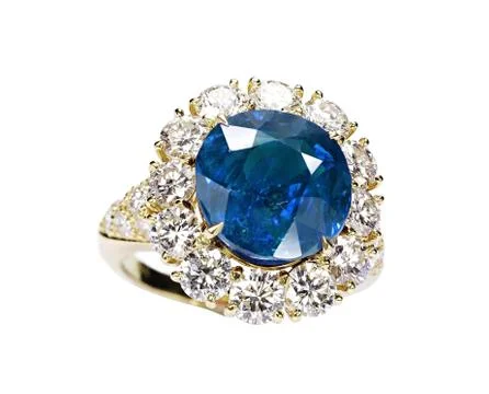 Beautiful ring with blue gem isolated on white Fotos Stock