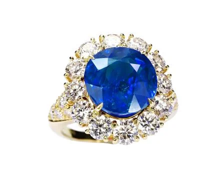 Beautiful ring with blue gem isolated on white Foto stock