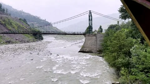 Beautiful River Flowing Through Mountainous Villages with Scenic Landscape Stock Footage 339778339