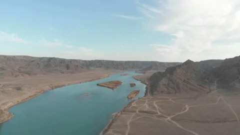 Beautiful river flows along the bottom of the canyon Stock Footage 146305615