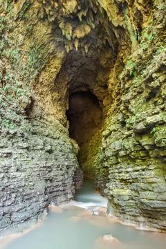 Beautiful river stream in the cave. Java island. Indonesia. Fotos de archivo