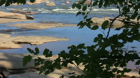 Beautiful river vista through trees Stock Footage 11058694