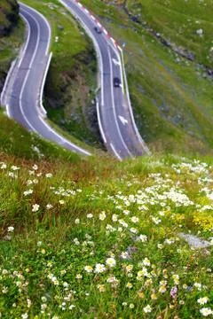 Beautiful road with curves, sinuous between hills and mountains Stock Photos