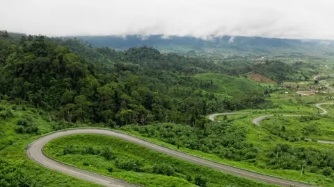 Beautiful road view on the hill with zigzag in Cambodia. 2K Stock Footage 246103121