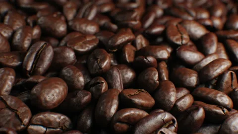 Beautiful Roasted Coffee Beans Seamless Turntable Rotation Close-up Slow Motion Stock Footage 101586659
