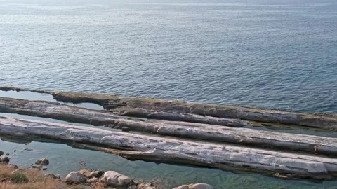 Beautiful rock formations at a beach in Davlos, Cyprus Stock Footage 255891877