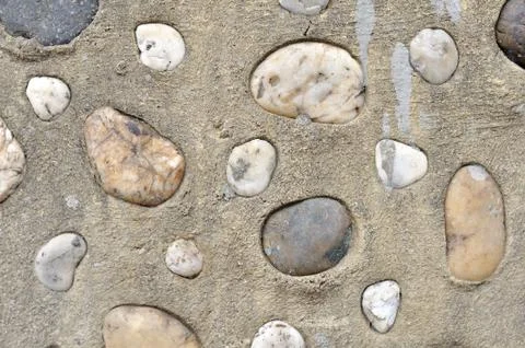 Beautiful rock pattern on cement wall Stock Photos