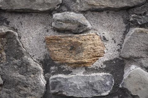 A beautiful rock pattern in an old wall Фото
