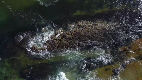 Beautiful rocks and waves fooatge ocean coast northern ireland 2.7 k drone Stock Footage 209186082
