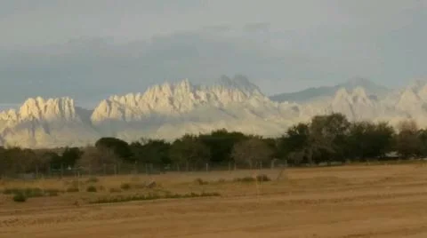 A beautiful rocky mountain range with a open field (southwest desert) Stock Photos