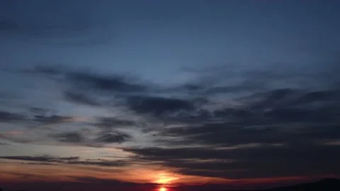 Beautiful romantic, romantic sunset with beautiful blurring clouds Stock Footage 135369953
