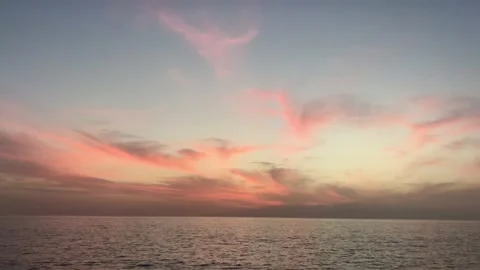 Beautiful romantic sunset with pink clouds. Dusk view Stock Footage 150342317