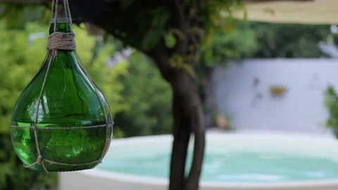 Beautiful round pool surrounded by green countryside Stock Footage 141325578