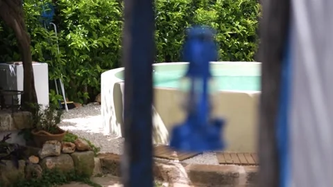 Beautiful round pool surrounded by green countryside Video stock 141326083