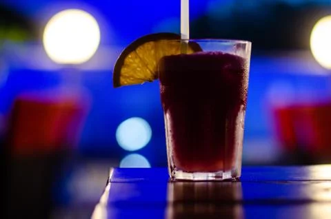Beautiful row line of different colored alcohol cocktails on a party, martini Stock Photos