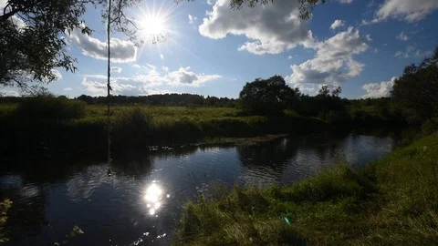 Beautiful russian small river and bungee jump rope on a tree Stock Footage 104956810