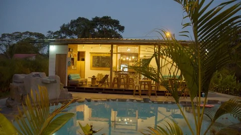 Beautiful rustic bar next to a pool in a lodge in ecuador Video stock 116207393