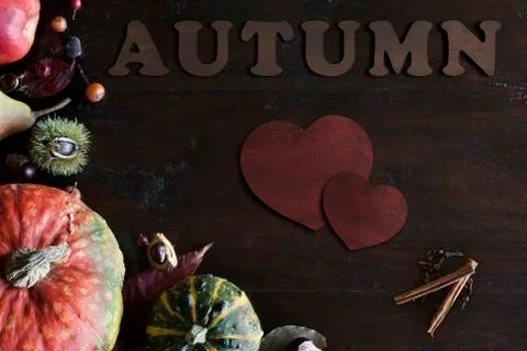 Beautiful rustic fall flat lay with leaves, pumpkins, chestnuts and letters Stock Photos