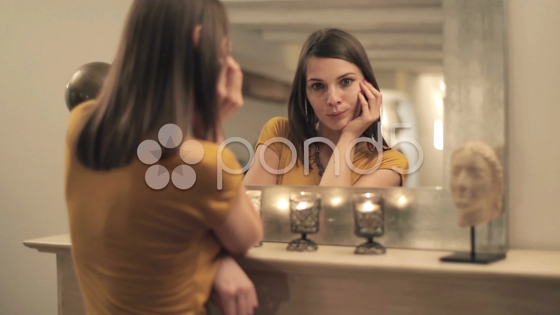 Beautiful sad, pensive woman by the mirror looking at camera HD, image size:1920x1080