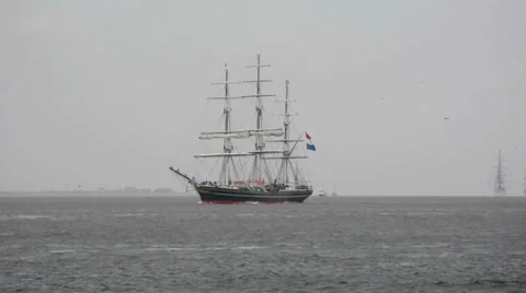 Beautiful sailing ship passing by Stock Footage 30439299