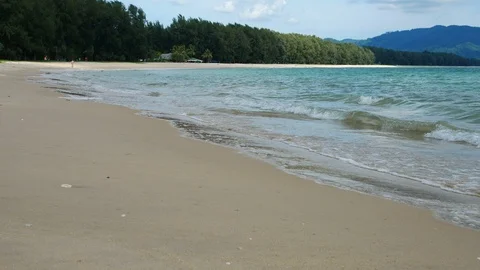 Beautiful sand beach with soft wave in sea water , cloudy blue sky sunny day, Stock Footage 90175742