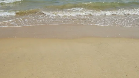 Beautiful sand beach with soft wave in sea water , cloudy blue sky sunny day Stock Footage 90217547