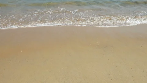 Beautiful sand beach with soft wave in sea water , cloudy blue sky sunny day Video stock 90218253