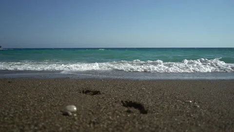 Beautiful sand beach with soft wave in sea water , blue sky sunny day Stock Footage 157967885