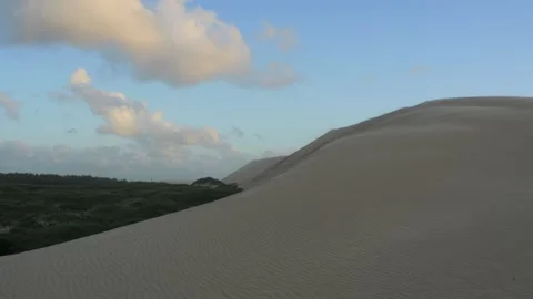 Beautiful sand dune landscape with moving clouds Stock-Footage 338092256