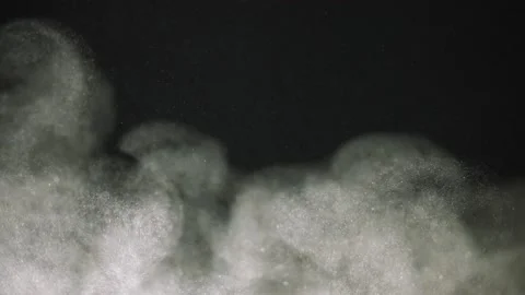 Beautiful sand dust particles soar up close up 動画素材 233663422