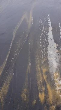 Beautiful sand pattern formed by yellow and black grains Foto stock