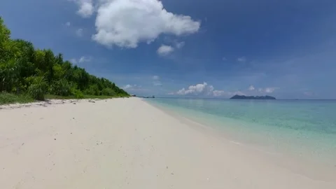 Beautiful sandy beach and blue sea. Stock Footage 235402485