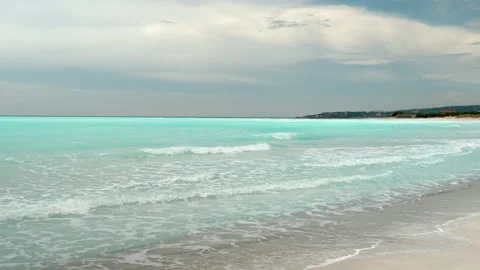 Beautiful sandy beach and pristine water in the Mediterranean Sea in Italy Stock Footage 158431235