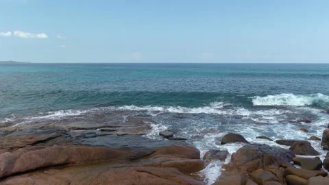 Beautiful sandy beach with blue sky and ocean waves on an exotic island Stock Footage 108646472