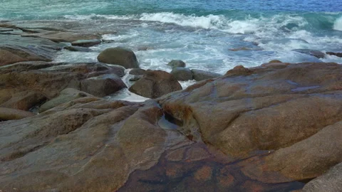 Beautiful sandy beach with blue sky and ocean waves on an exotic island Stock Footage 109258491