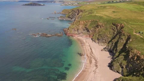 Beautiful Sandy Beach, Cliffs &amp; Blue Crystal Clear Ocean - Aerial Drone Footage Stock Footage 160074962