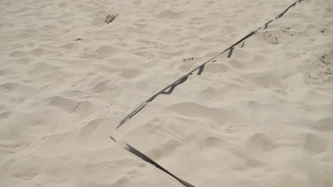 A Beautiful Sandy Beach featuring Unique Patterns and Textures under Natural Stock Footage 306532270