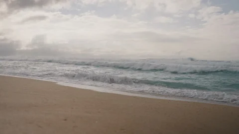 Beautiful Sandy Beach with Splashing Waves 4K Stock Footage 267048390